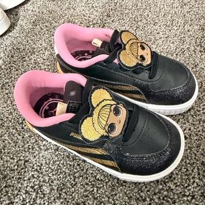 Puma Kids Sneakers in Black and Gold with Pink Highlights